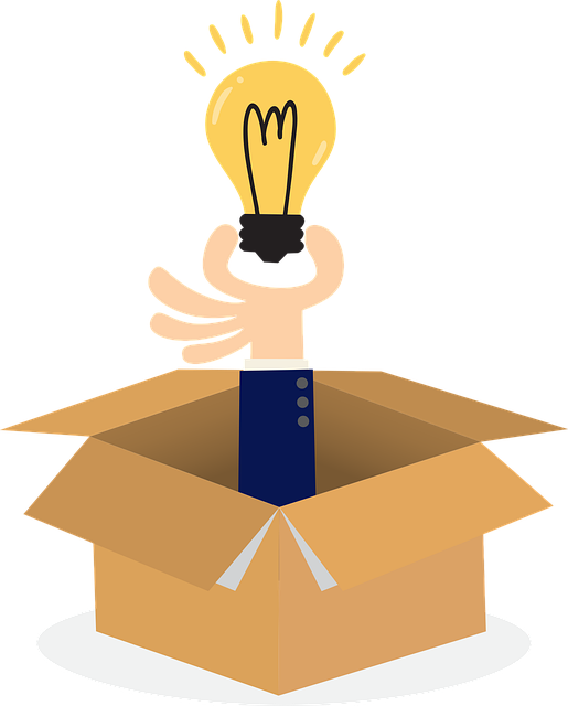hand reaching out of box holding lightbulb